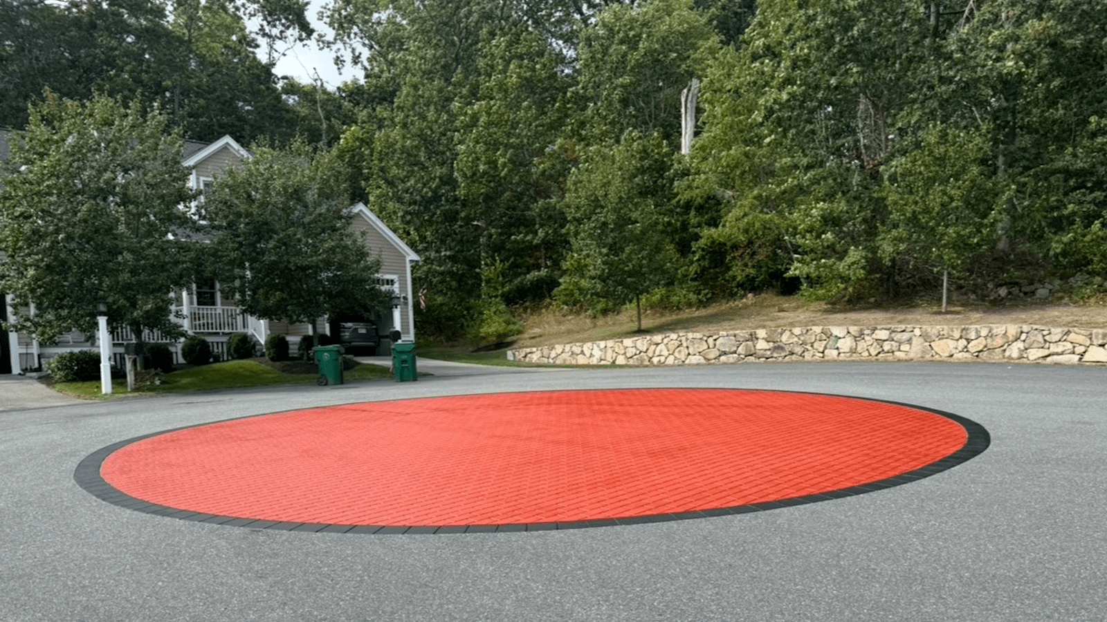 kitchen with marble countertop and wooden cabinets
